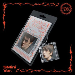 Mini album set with photo card and keychain charm in retail packaging