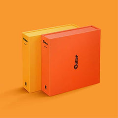 Butter product boxes in cream and orange with black logo