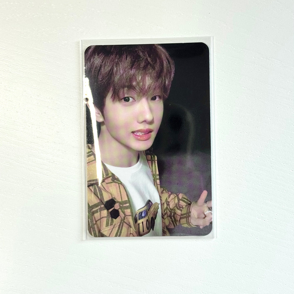 Dream Show photocard with Jisung portrait, dark hair, plaid jacket, and pink lips
