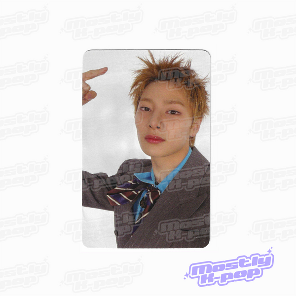 Photo card featuring a member portrait with spiky blond hair and dark jacket