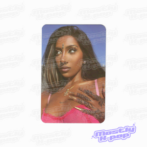 Collectible photocard with a portrait of a woman in a pink top and dark hair