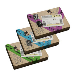 Stacked Layover album boxes in brown with blue, purple, and green label text